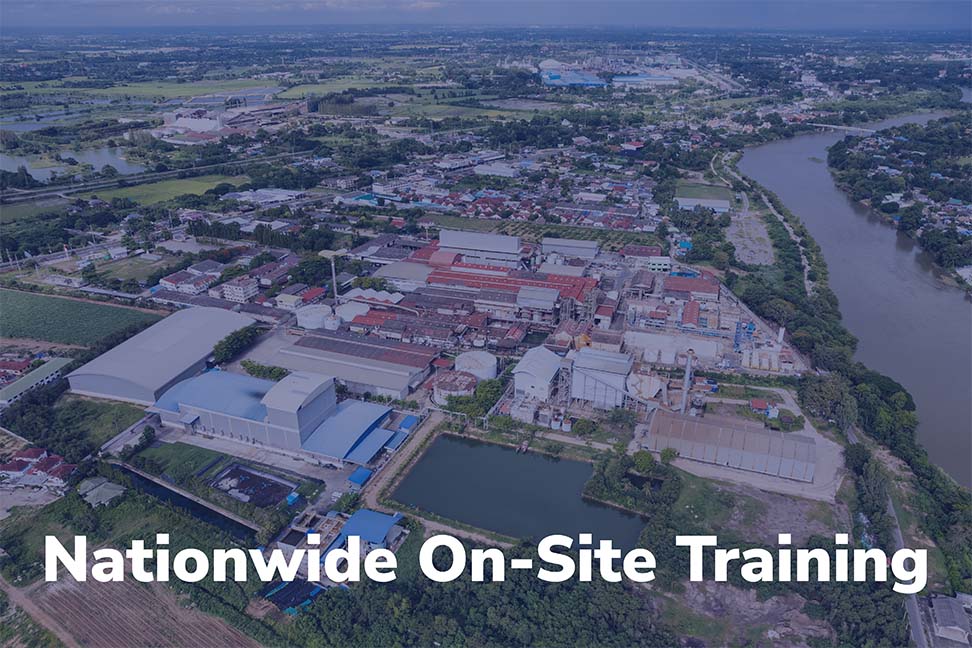 Aerial view of an industrial facility representing nationwide on-site NFPA 70E training availability.